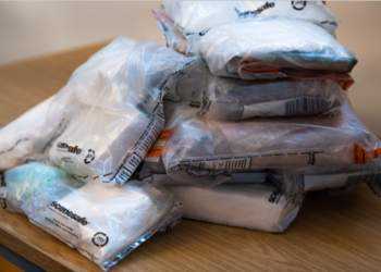 Police seize drugs worth almost £1m as well as £100,000 cash after arrest