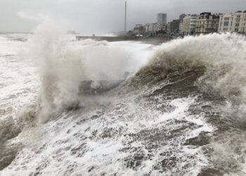 Rogue trader warning as storms damage dozens of homes