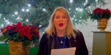 Sussex MP unveils the winner of her Christmas card competition