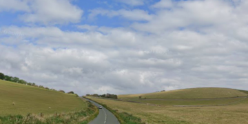 Seven Sisters tractor fire closes road
