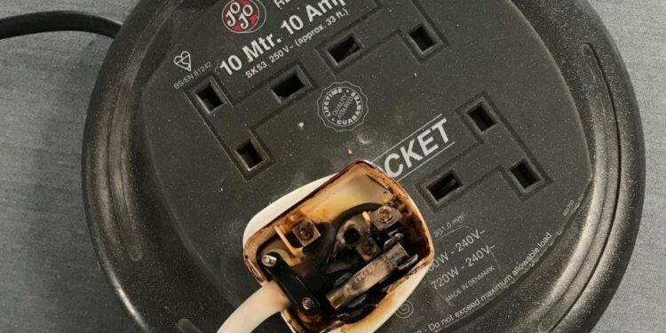 Lucky escape after overloaded plug socket fire burns itself out
