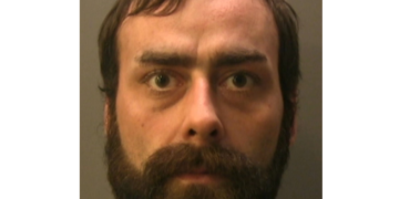 Knife-wielding post office robber jailed for 12 years