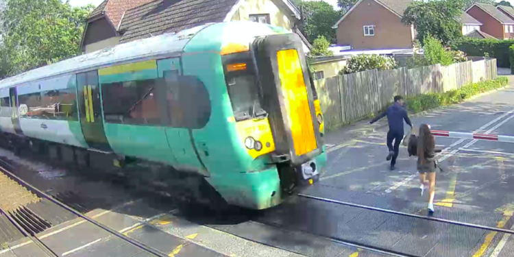Shocking video shows people dicing with death on rail level crossings