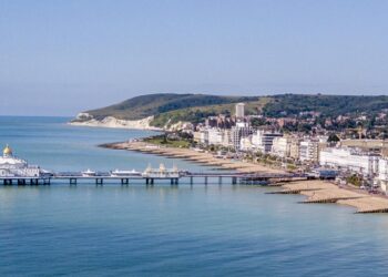 Second man charged with raping woman on beach