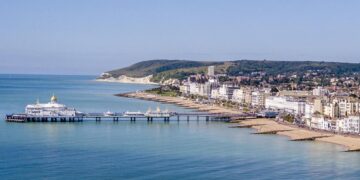 Second man charged with raping woman on beach