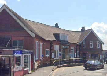 Boy, 16, held after man stabbed near railway station