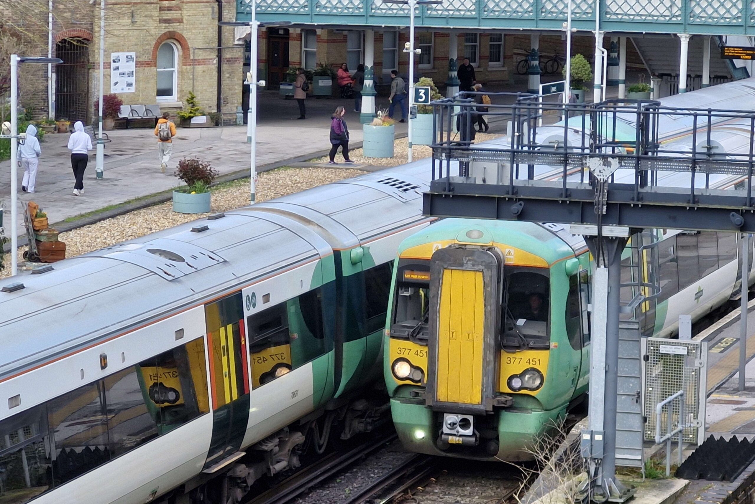 Power cut halts trains, leaves crossing barriers down and brings rush-hour jams on roads
