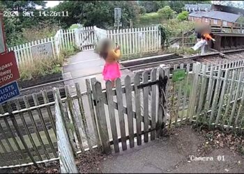 Shocking footage shows people posing for selfies on railway track