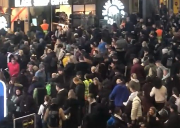 Gatwick railway station evacuated after train catches fire