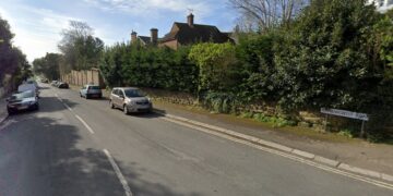 Axeman on the run after house raid