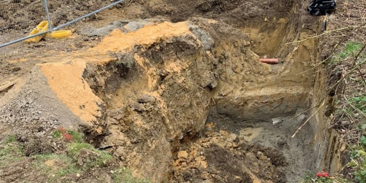 Builder fined £18k after worker had to be dug out of collapsed hole