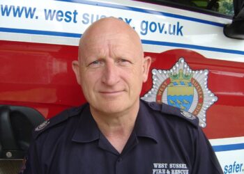 King honours longest-serving firefighter