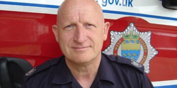 King honours longest-serving firefighter