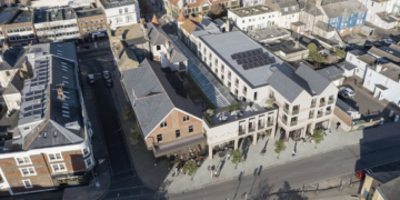 Delay to £8m plan for flats above arcade