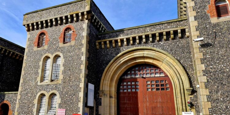 Four go on trial charged with throwing drugs and phone into prison