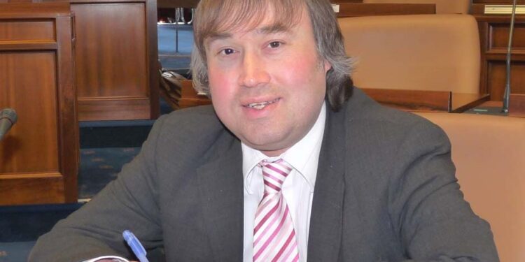 Richard Burrett Tributes paid as long-serving councillor dies aged 57