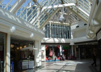 Shopping centre closed after panel falls from roof
